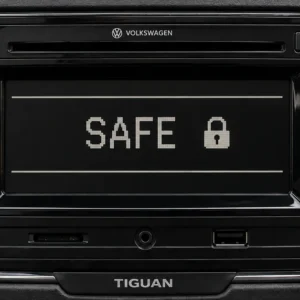 VW Tiguan radio displaying SAFE with a lock symbol